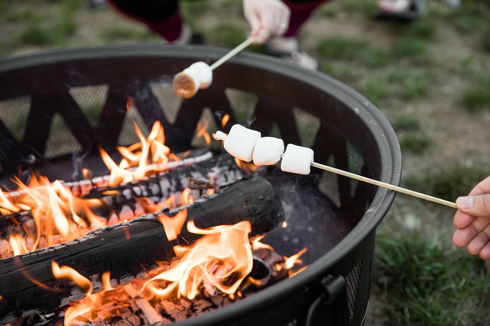 People enjoying outdoor fire pit