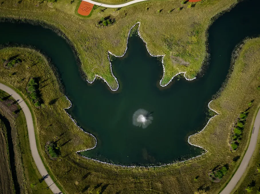 Aerial view of the maple leaf pond in Village at Griesbach