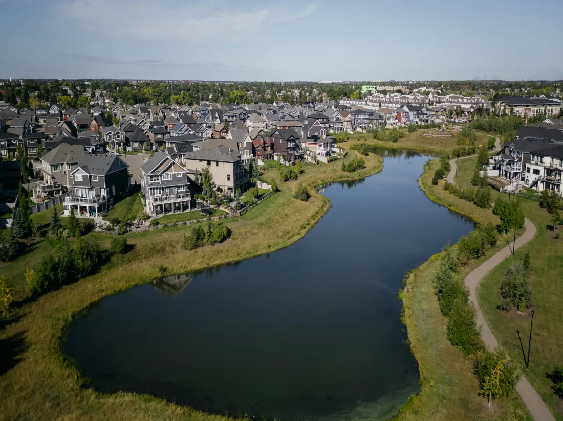 Aerial view of Roudel Lake and surrounding homes in Village at Griesbach